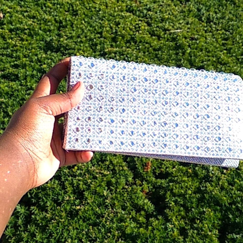 Shiny silver clutch purse